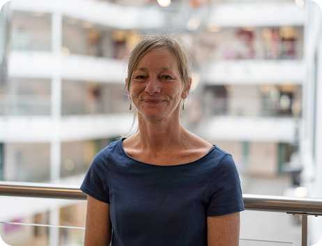 Member of HVA staff smiling