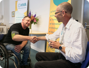 The CEO of HVA shakes a man's hand