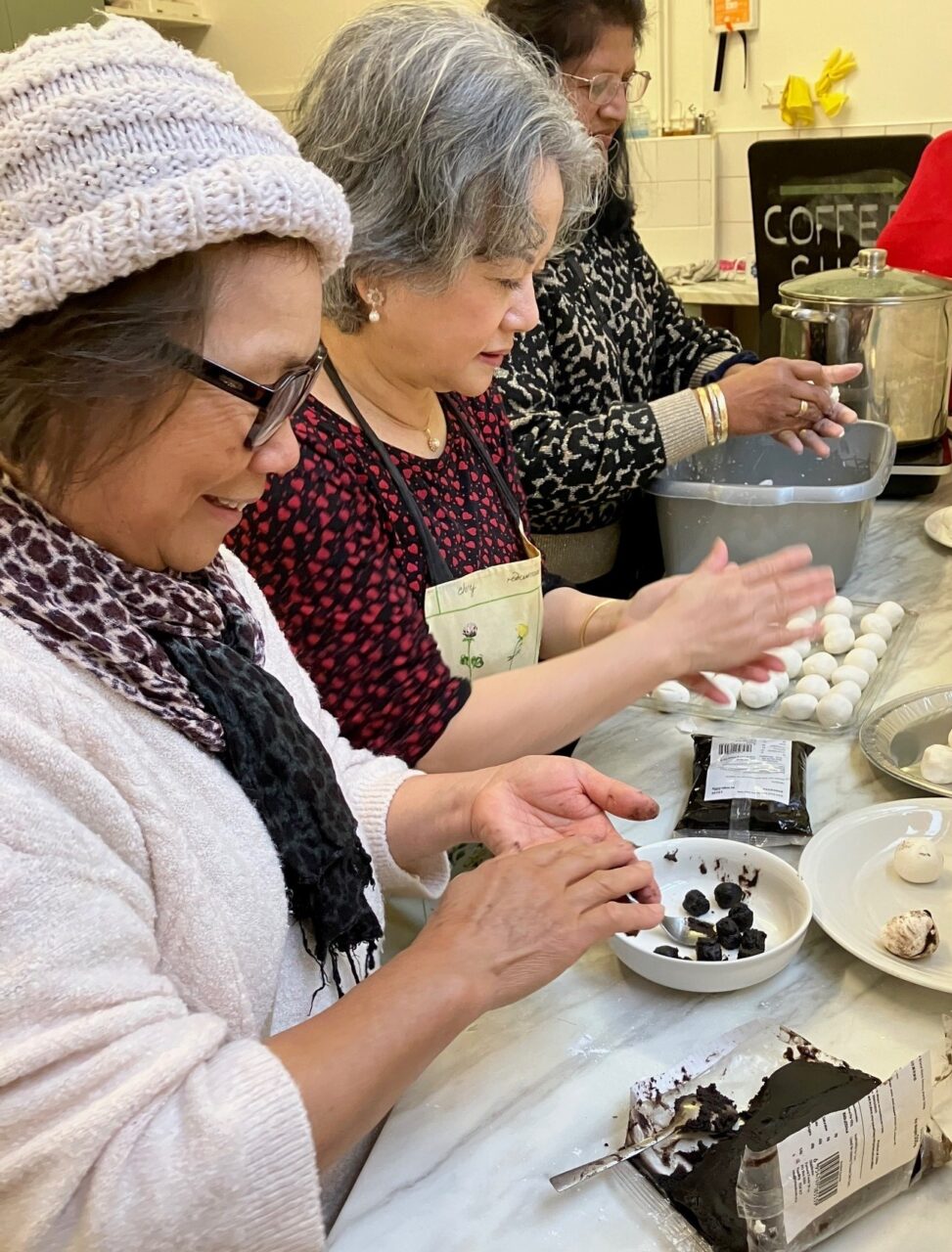 People making food together