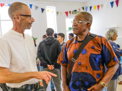 Two people talking at an event